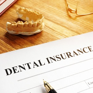 Patient in Jupiter reviewing dental insurance coverage