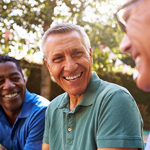 a group of friends talking and smiling