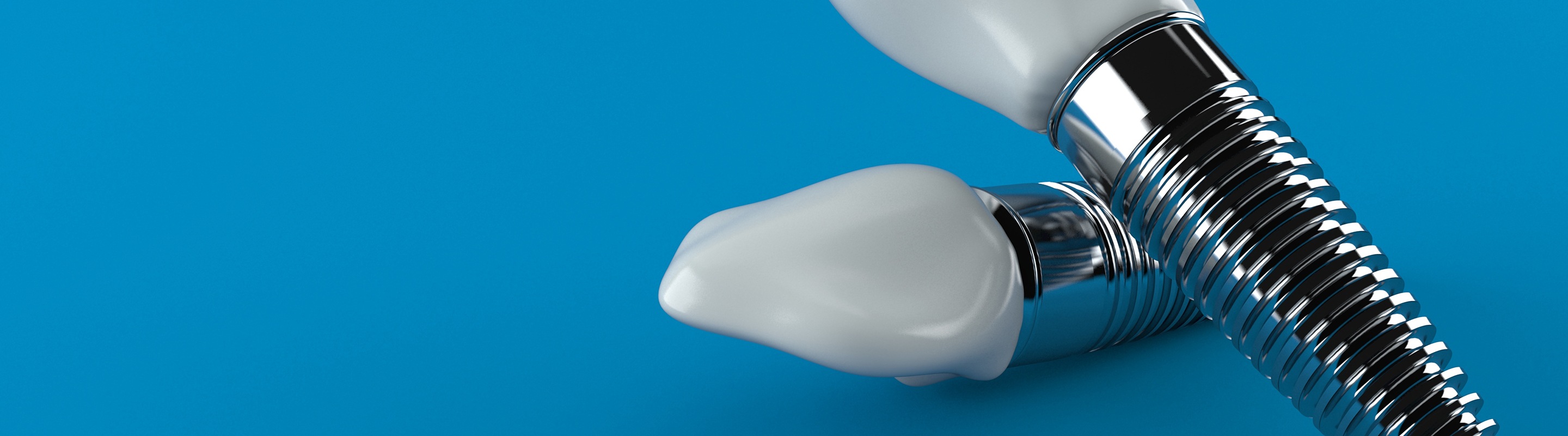 dental implants against a blue background