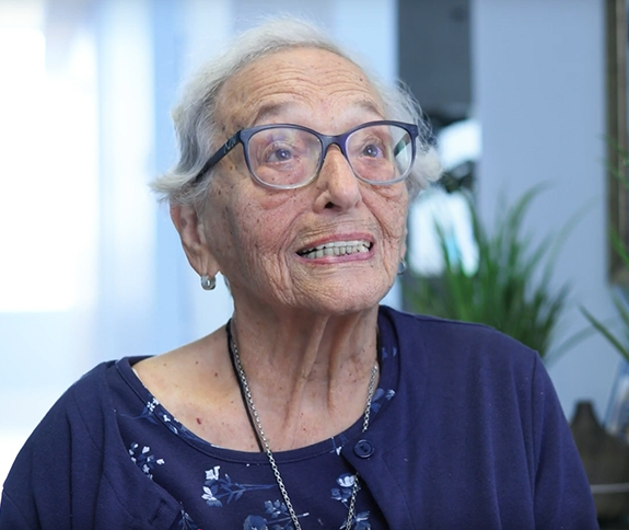 Senior woman in a dark blue blouse